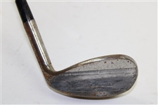Greg Norman's Personal Used Unmarked Pitching Wedge with Lead Tape