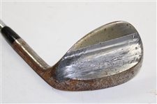 Greg Norman's Personal Used Unmarked Pitching Wedge with Lead Tape