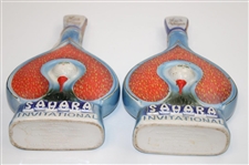 Two (2) 1971 Las Vegas Sahara Invitational Ceramic Jim Beam 100 Bottles