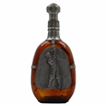 Amber-Colored Bottle w/1920s Post-Swing Golfer in Relief on Pewter Triangular Plaque & Stopper