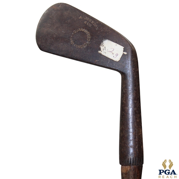 A Johnson & Company Guaranteed Hand Forged Long Iron