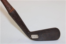 A Johnson & Company Guaranteed Hand Forged Long Iron