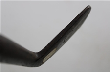 A Johnson & Company Guaranteed Hand Forged Long Iron