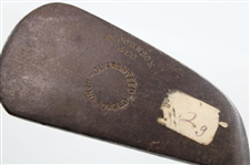 A Johnson & Company Guaranteed Hand Forged Long Iron