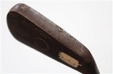 A Johnson & Company Guaranteed Hand Forged Long Iron