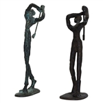 Pair Of Male & Female Driving Bronze Sculptures