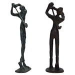 Pair Of Male & Female Driving Bronze Sculptures