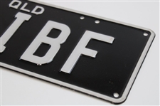 Two (2) Ian Baker Finch Personal License Plates