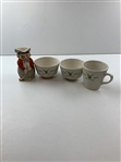 A Group of Ceramic Golf-Themed Tableware and a Figural Character Jug