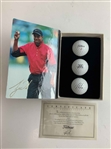 A Set of Seven Tiger Woods Titleist Commemorative Limited Edition Golf Ball Box Sets with Display Rack