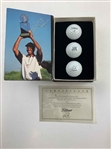 A Set of Seven Tiger Woods Titleist Commemorative Limited Edition Golf Ball Box Sets with Display Rack