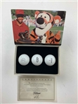 A Set of Seven Tiger Woods Titleist Commemorative Limited Edition Golf Ball Box Sets with Display Rack