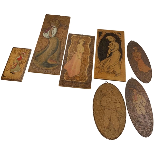 Seven Art Nouveau/Arts & Crafts Plaques Featuring Golfers