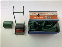 A Group of Vintage Lawn Care Collectibles Including a Dinky Supertoys No. 751 Lawn Mower