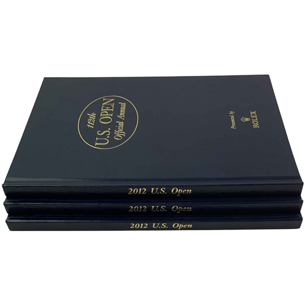 A Trio of 2012 112th U.S. Open Official Annual Books Presented by Rolex