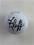 A Trio of Golf Balls Signed by Tiger Woods Caddies Mike Fluff Cowan Steve Williams and Joe LaCava JSA ALOA