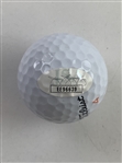 A Trio of Golf Balls Signed by Tiger Woods Caddies Mike Fluff Cowan Steve Williams and Joe LaCava JSA ALOA