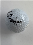 A Trio of Golf Balls Signed by Tiger Woods Caddies Mike Fluff Cowan Steve Williams and Joe LaCava JSA ALOA