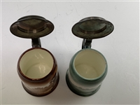 A Pair of Early 1900's O'Hara Dial Co. Collegiate Golf Theme Lidded Steins