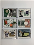 A Collection of Twenty Three Upper Deck Golf Memorabilia Trading Cards Featuring Authentic Fabric Swatches 2001-2003