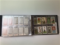 An Assortment of Vintage Golf Cigarette and Tobacco Cards in Album