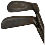 A Pair of Vintage Novakclub Universal Adjustable Golf Clubs
