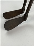 A Pair of Vintage Novakclub Universal Adjustable Golf Clubs