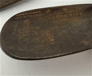 Two Vintage Hickory-Shafted Golf Clubs Including a Spalding Mid-Iron and a George Nicoll Zenith Niblick