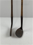 Two Vintage Hickory-Shafted Golf Clubs Including a Spalding Mid-Iron and a George Nicoll Zenith Niblick