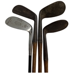 An Assortment of Antique Hickory and Transitional Steel Shafted Golf Irons Including J.H. Taylor and Spalding