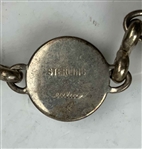 Two Vintage Golf Themed Jewelry Items Including an Ecclia Sterling Silver Bracelet and a The Reddy Tee Brooch