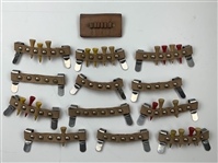 A Collection of Vintage Golf Ephemera, Instructional Booklets, and Val M. Brooks Leather Tee Holders