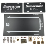 An Assortment of Golf Accessories and Memorabilia Featuring Bridgestone, Wilson, Hogan, and BagBoy