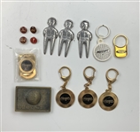 An Assortment of Golf Accessories and Memorabilia Featuring Bridgestone, Wilson, Hogan, and BagBoy