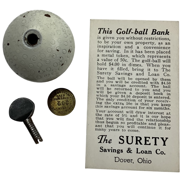 C. 1920’s The Surety Savings and Loan Company Promotional Golf Ball Bank with Original Token, Key, and Card