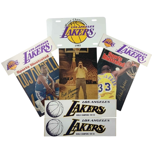 A Collection of Los Angeles Lakers Memorabilia Including Signed Sports Illustrated Magazines and Promotional Items