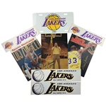 A Collection of Los Angeles Lakers Memorabilia Including Signed Sports Illustrated Magazines and Promotional Items