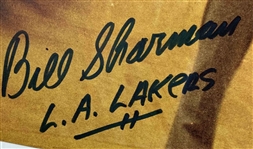 A Collection of Los Angeles Lakers Memorabilia Including Signed Sports Illustrated Magazines and Promotional Items