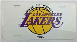 A Collection of Los Angeles Lakers Memorabilia Including Signed Sports Illustrated Magazines and Promotional Items