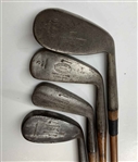 A Set of Four Antique Hickory Shaft Golf Clubs Including Tom Stewart St. Andrews Irons